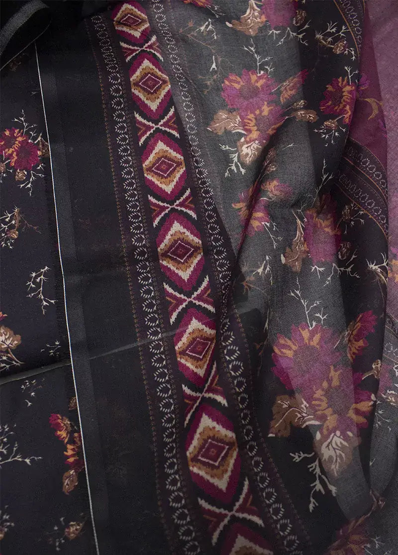 Close-up of a floral-patterned fabric with a dark background