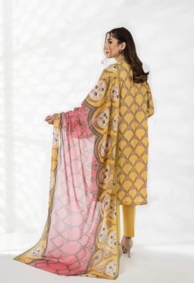 A model wearing the Nishat 3pc Unstitched Doriya Lawn Yellow suit
