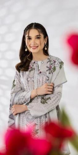 Close-up of the printed design and Doriya texture of the Nishat 3pc Unstitched Doriya Lawn Ash White shirt