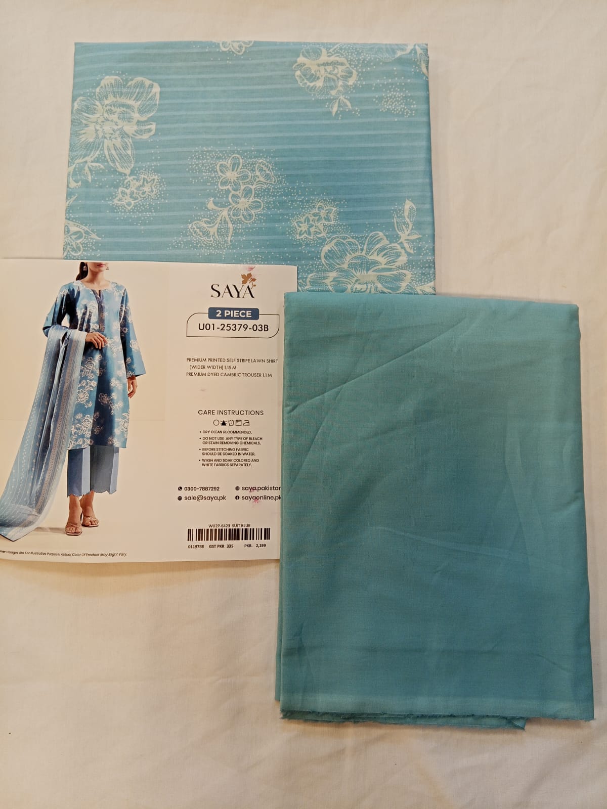 Model wearing Saya 2pc Unstitched Lawn Suit