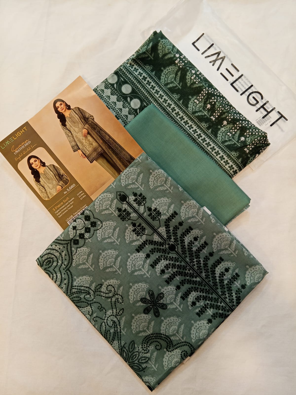 Detailed print and soft lawn weave of the Pistachio Cream LimeLight Lawn 3pc Suit.