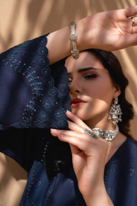 Blue Iconic Rujhan Luxury Cotton 3pc suit worn by model for Eid 2026 festive celebrations.