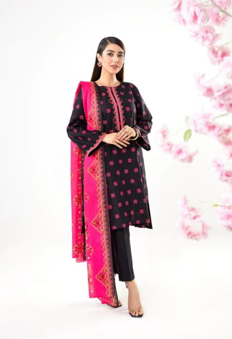 A model wearing the Nishat 3pc Unstitched Doriya Lawn Black suit