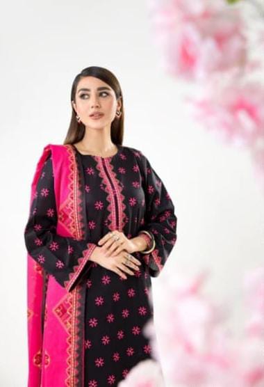A model wearing the Nishat 3pc Unstitched Doriya Lawn Black suit