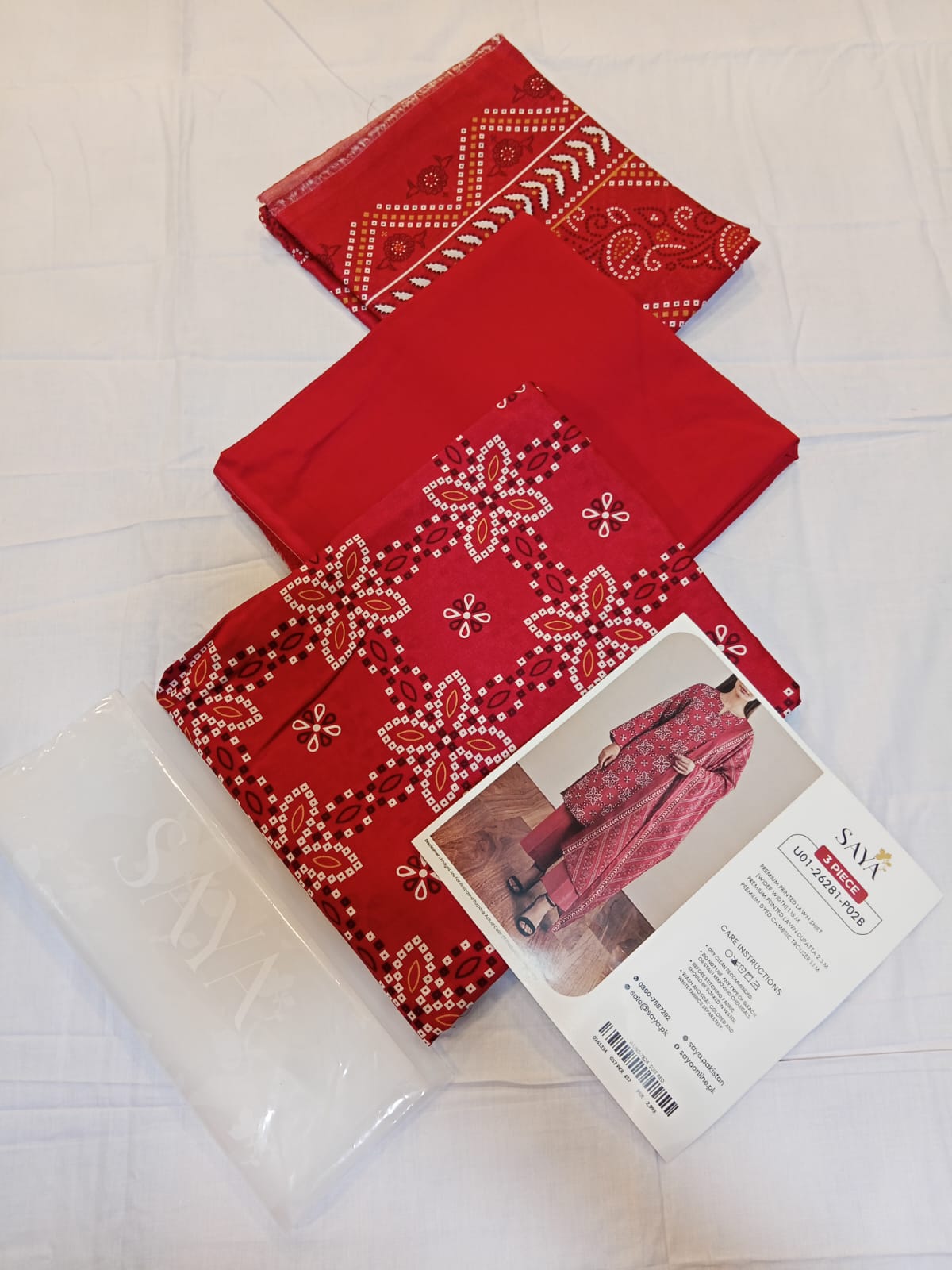 shot of the Saya Printed Lawn Suit Red