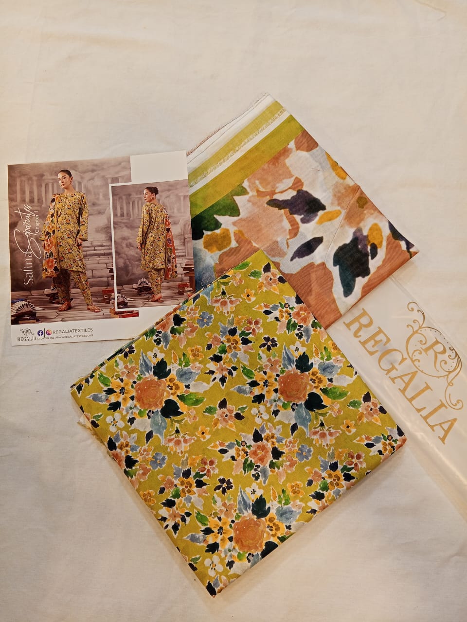 Detailed grain and earthy print of the Olive Green Salina Separates Lawn Collection fabric.