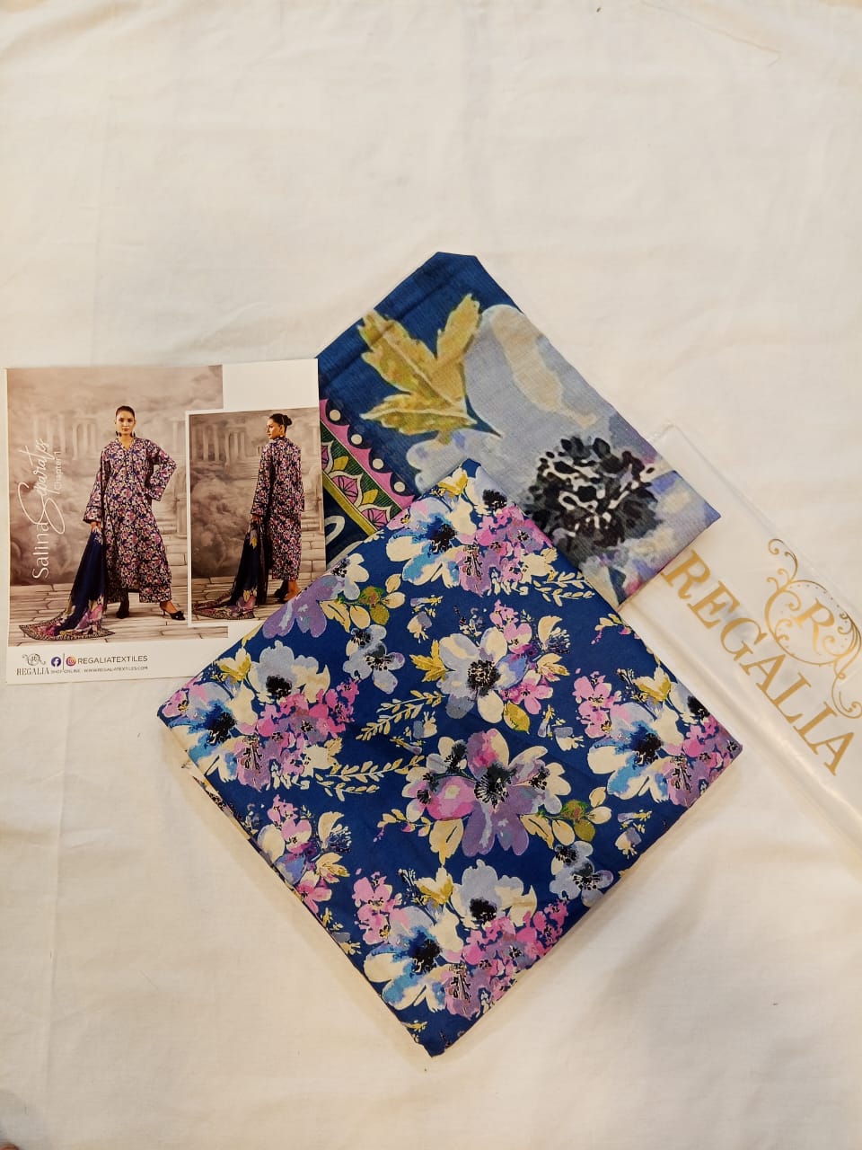 Close-up of the deep blue saturated prints and soft lawn of the Salina Separates Lawn Collection.