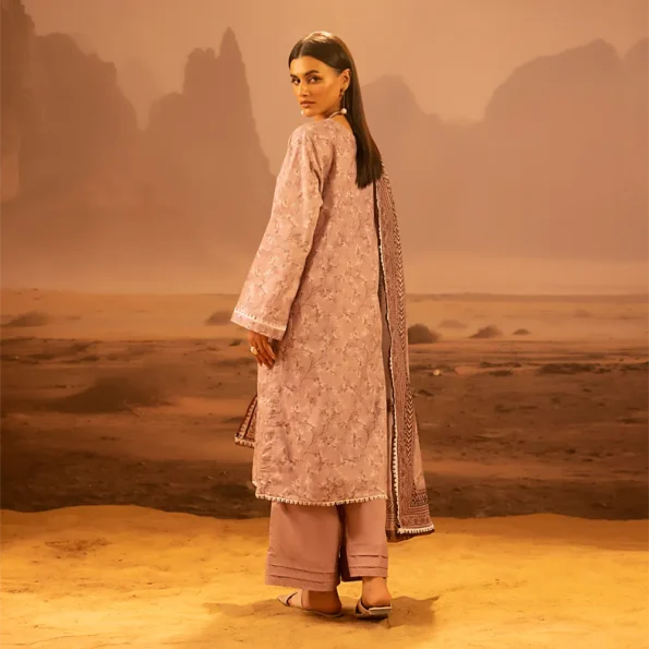 A model wearing the Salina 3pc Unstitched Mid Summer Cotton Dusty Pink suit