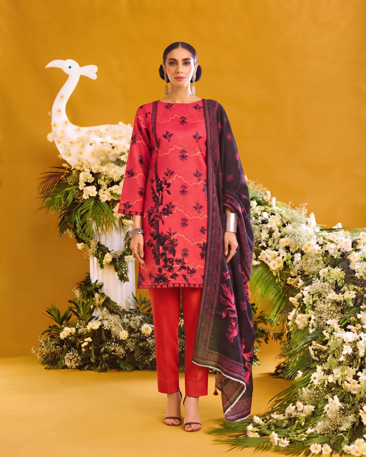 Model wearing ETHNC Lawn 3pc Unstitched in crimson rose with floral design, featuring a dupatta and trousers.