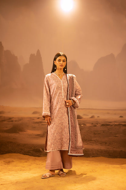 A model wearing the Salina 3pc Unstitched Mid Summer Cotton Dusty Pink suit