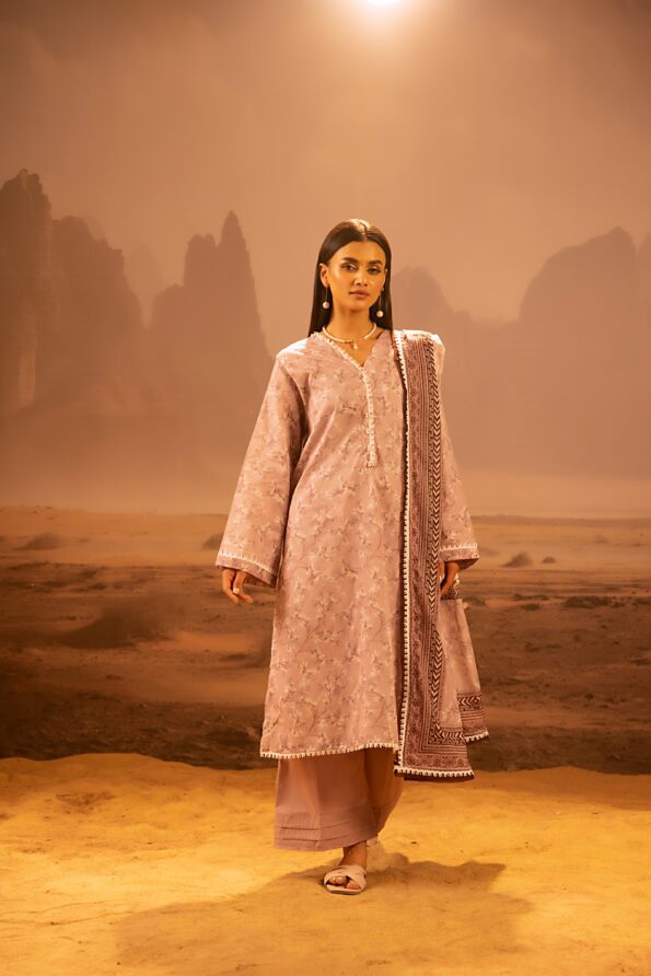 A model wearing the Salina 3pc Unstitched Mid Summer Cotton Dusty Pink suit