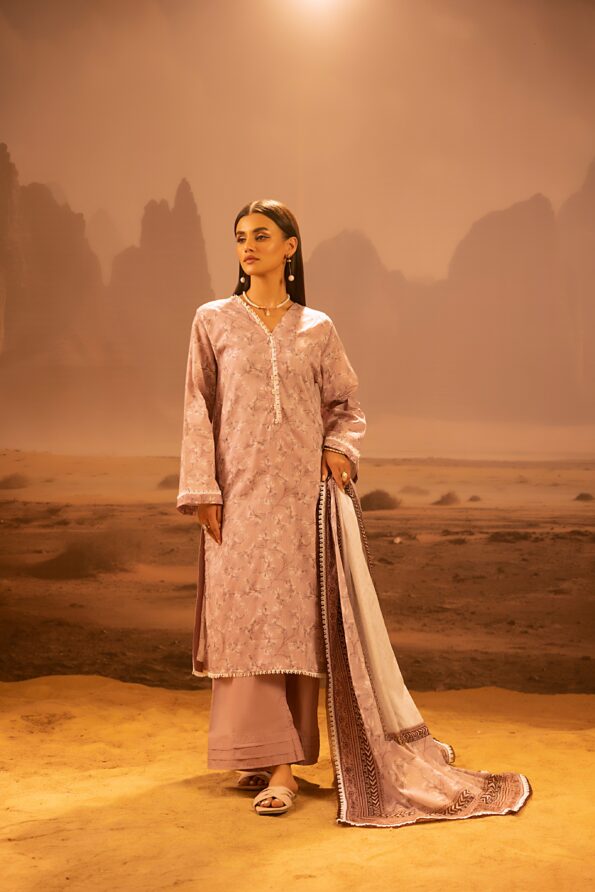 A model wearing the Salina 3pc Unstitched Mid Summer Cotton Dusty Pink suit