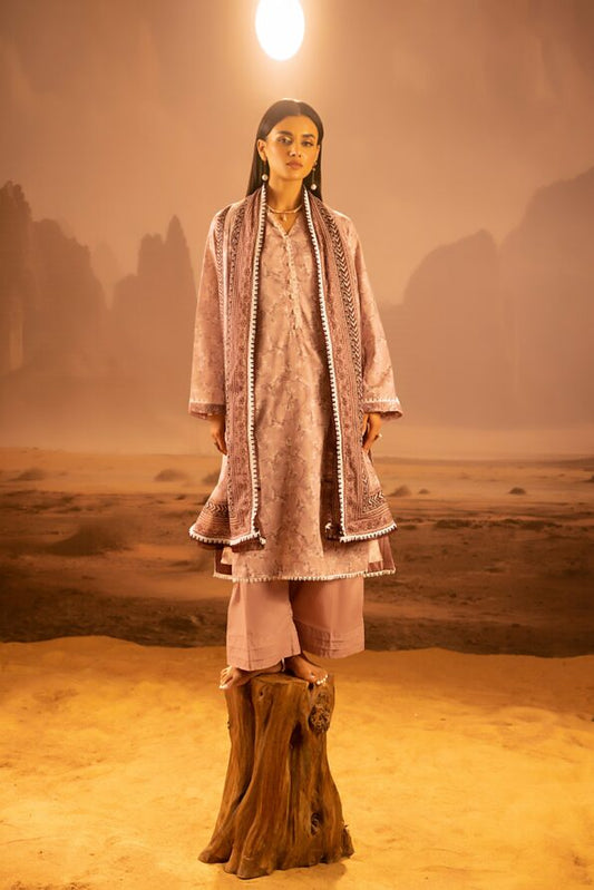 A model wearing the Salina 3pc Unstitched Mid Summer Cotton Dusty Pink suit