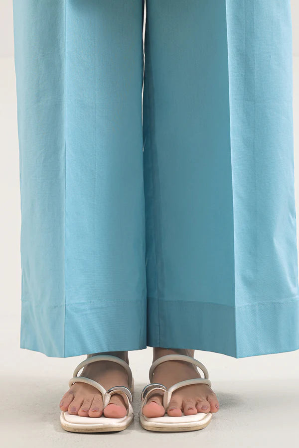 Model wearing Saya 2pc Unstitched Lawn Suit