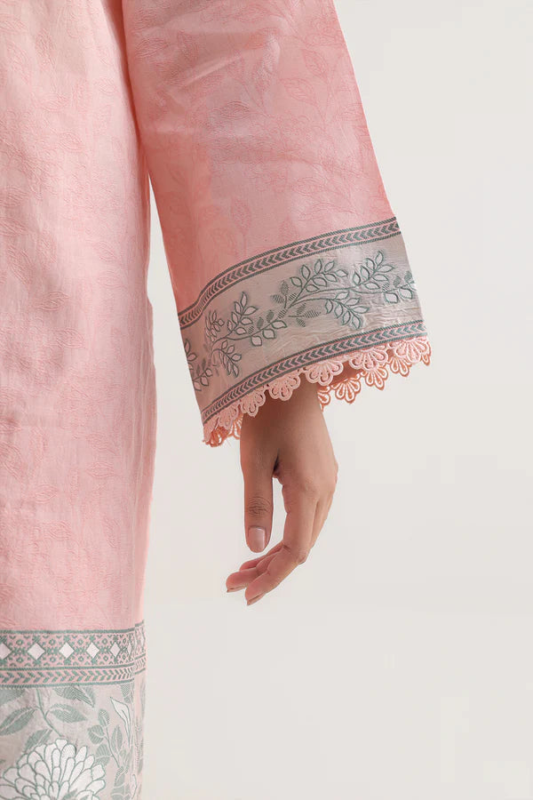 Peach Saya Cotton Jacquard 3pc suit worn by model showcasing luxury unstitched tailoring.