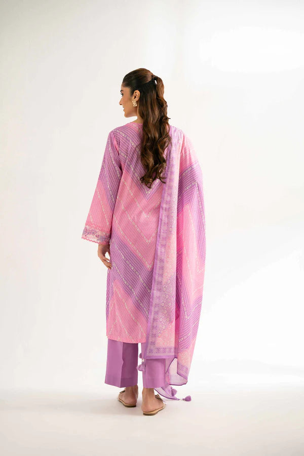 Lifestyle view of a custom-tailored Nisha By Nishat Embroidered Lawn 3pc suit