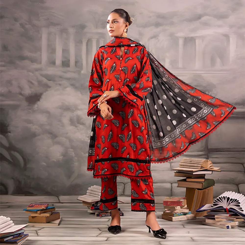 Red Salina Separates Lawn Collection suit worn by model for a bold, festive summer look.