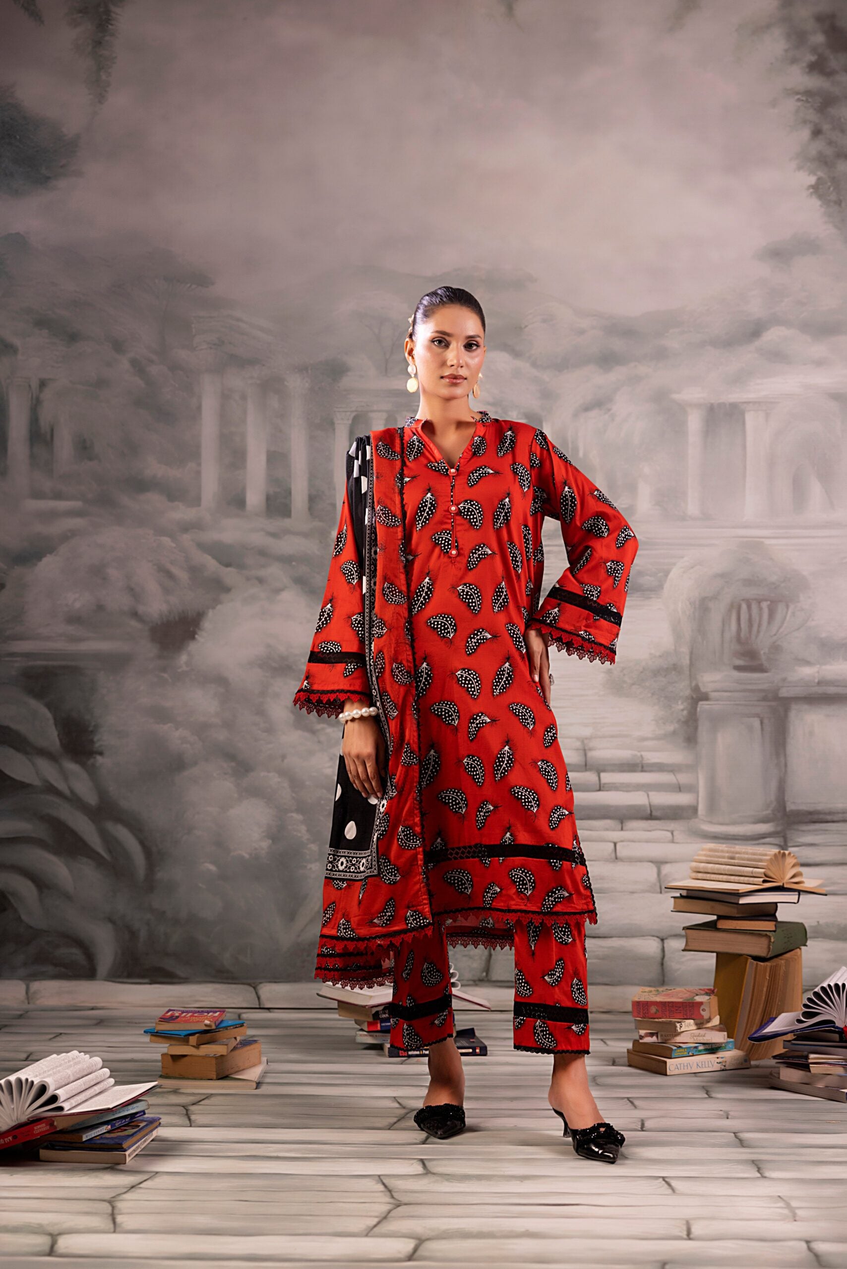 Red Salina Separates Lawn Collection suit worn by model for a bold, festive summer look.