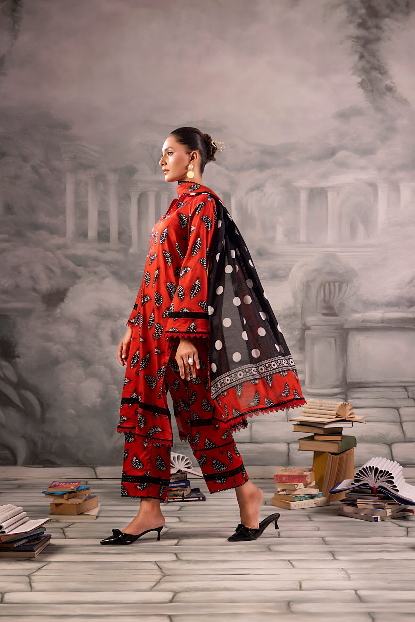 Red Salina Separates Lawn Collection suit worn by model for a bold, festive summer look.