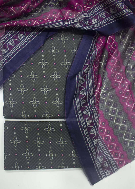 Folded fabric with purple and gray pattern on a white background