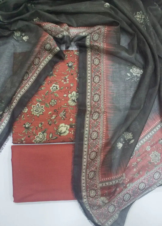 Black and red embroidered fabric with floral patterns on a white background