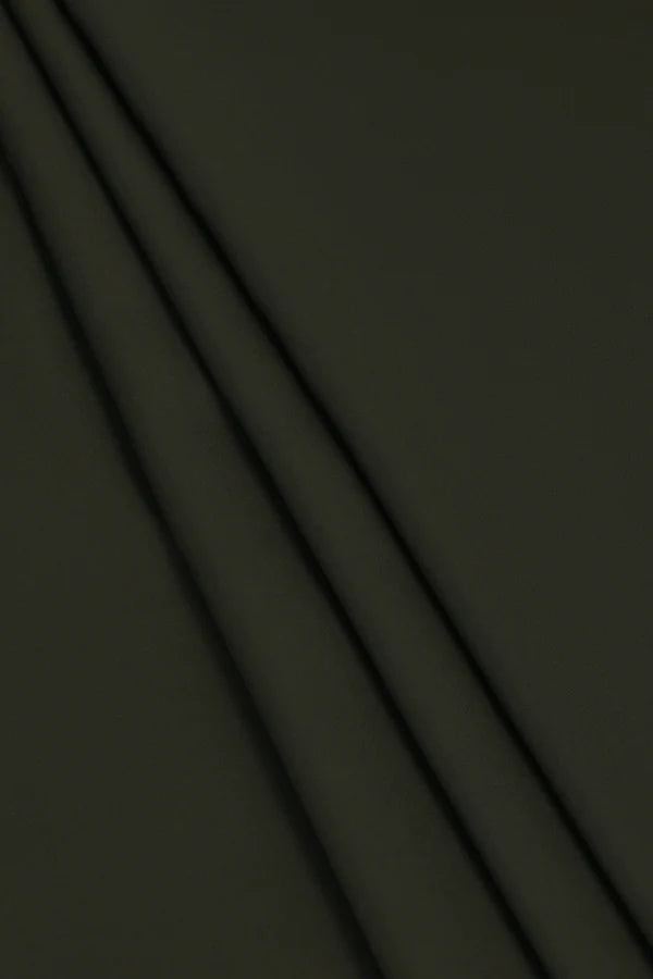 Close-up texture and weave of Dark Green Zellbury Mens Wash and Wear 100% premium fine quality fabric.