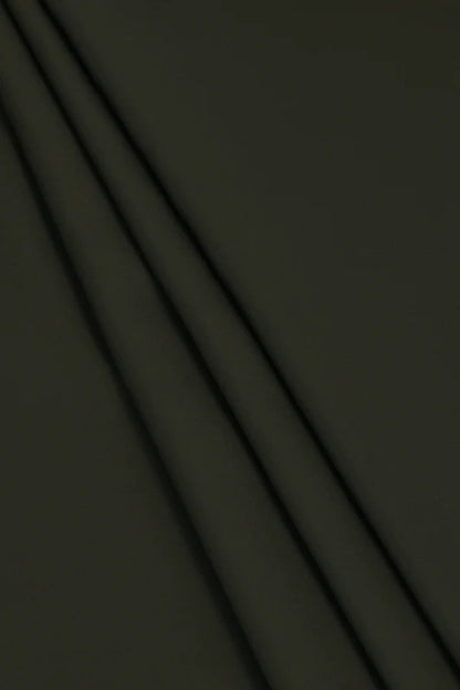 Close-up texture and weave of Dark Green Zellbury Mens Wash and Wear 100% premium fine quality fabric.