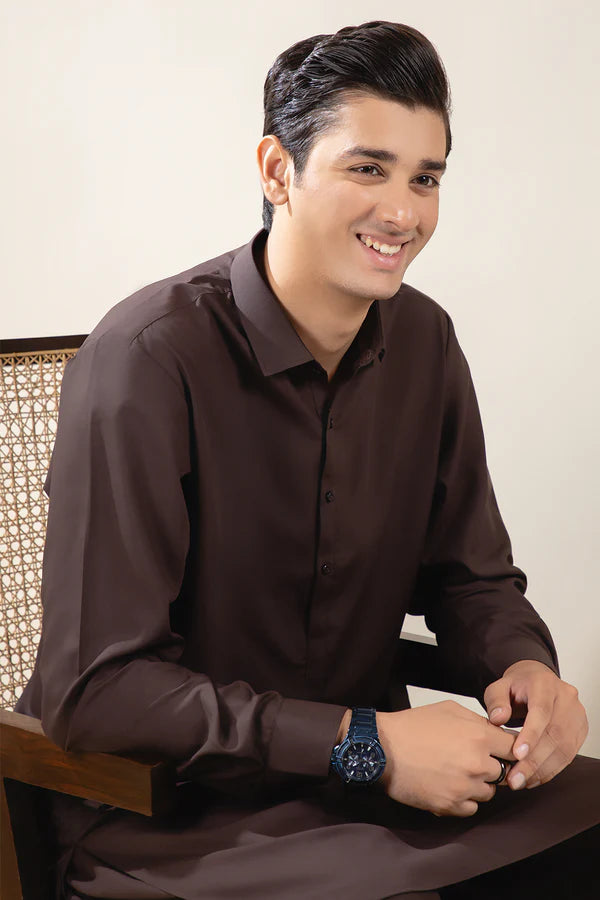 Brown Zellbury Mens Wash and Wear unstitched suit worn by a model showcasing a sharp tailored fit for Summer 2026.