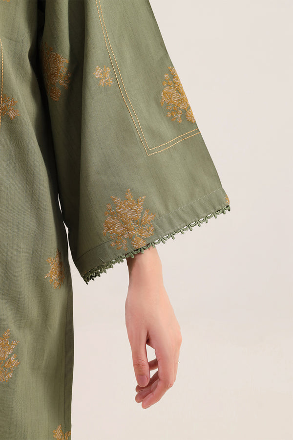 Sage Green Saya Cotton Jacquard 3pc suit worn by model showcasing luxury unstitched tailoring.