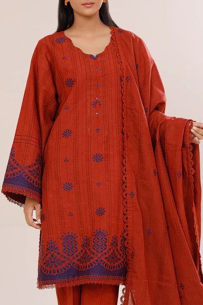 Rust Saya Cotton Jacquard 3pc suit worn by model showcasing luxury unstitched tailoring.