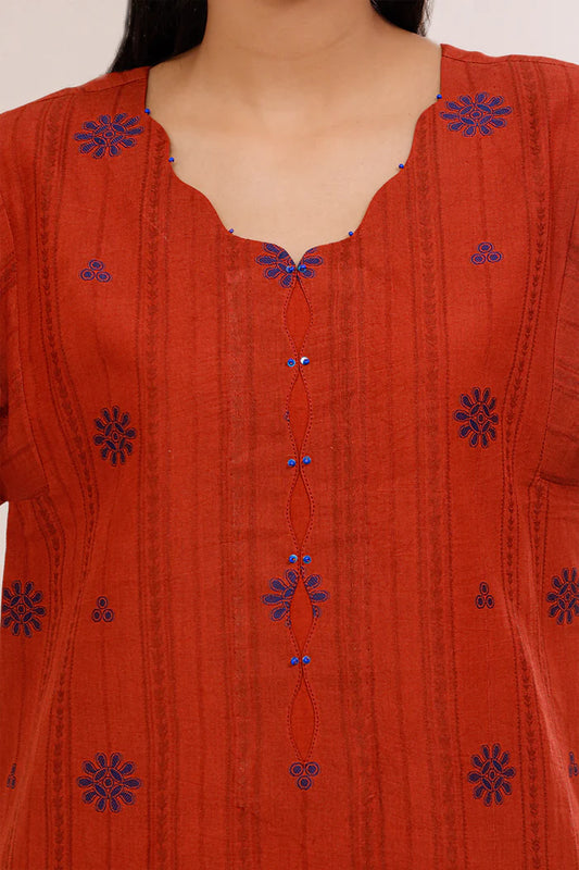 Rust Saya Cotton Jacquard 3pc suit worn by model showcasing luxury unstitched tailoring.