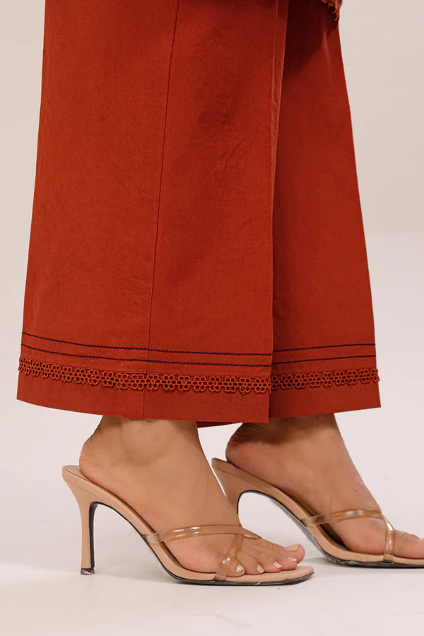 Rust Saya Cotton Jacquard 3pc suit worn by model showcasing luxury unstitched tailoring.