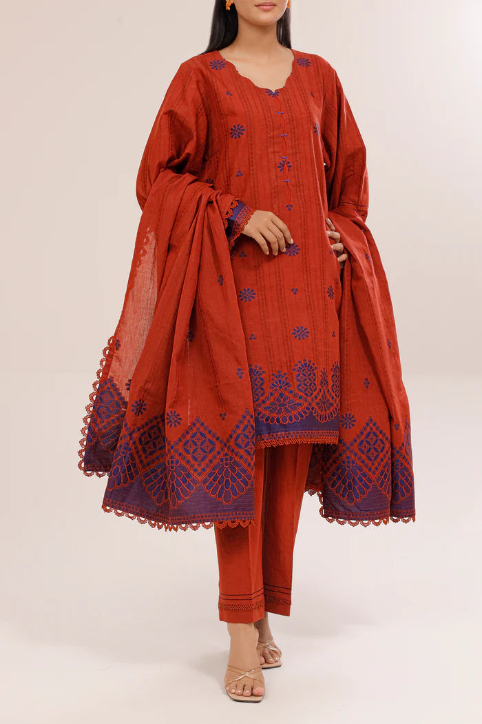Rust Saya Cotton Jacquard 3pc suit worn by model showcasing luxury unstitched tailoring.