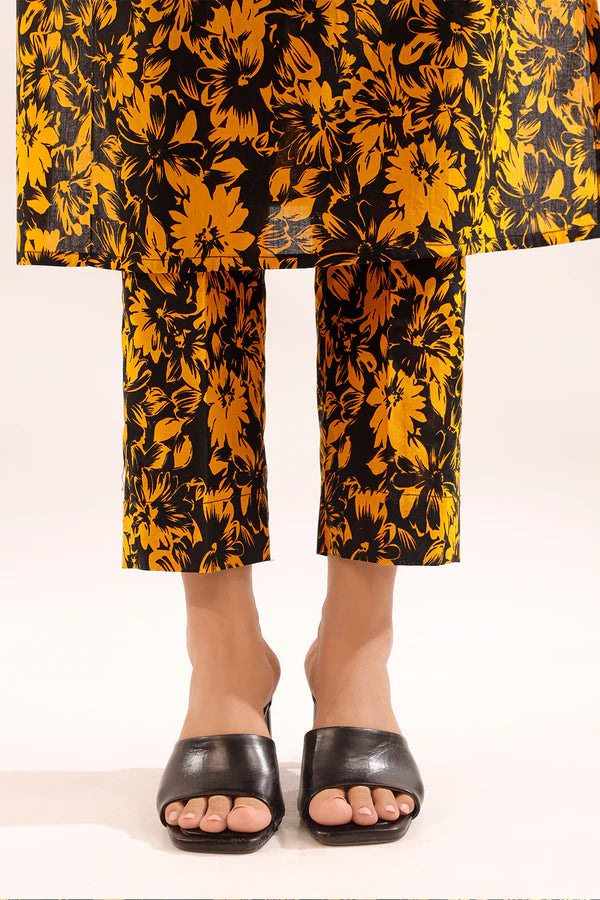 Model wearing Saya 2PC Unstitched Lawn Suit