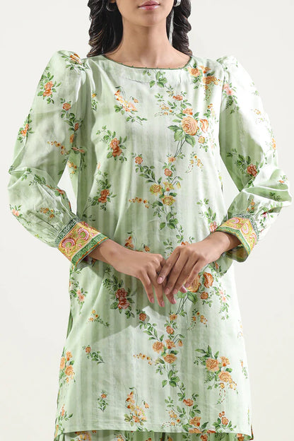 Model wearing Saya 2PC Unstitched Lawn Suit