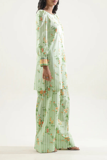 Model wearing Saya 2PC Unstitched Lawn Suit