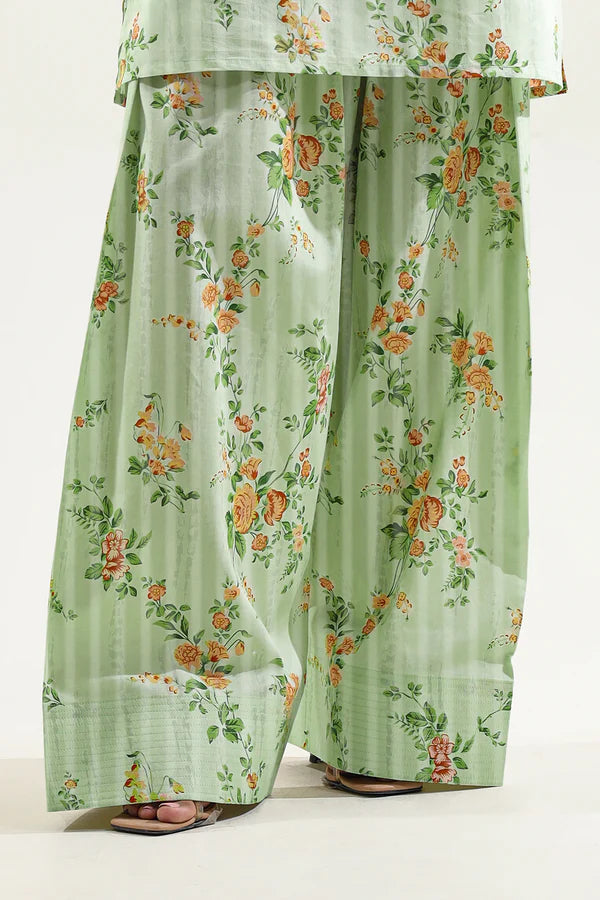 Model wearing Saya 2PC Unstitched Lawn Suit