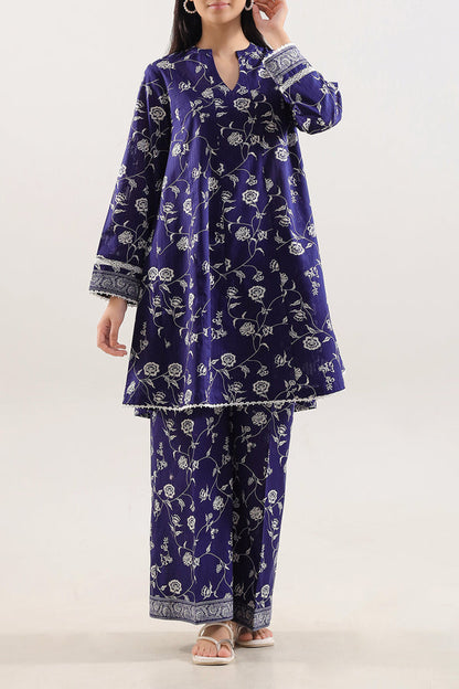 Model wearing Saya 2pc Unstitched Lawn Suit