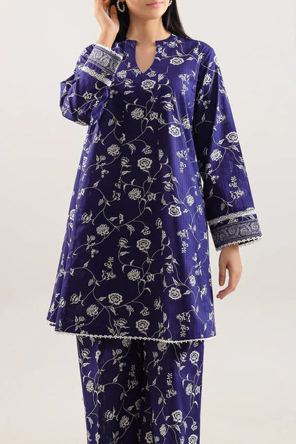 Model wearing Saya 2pc Unstitched Lawn Suit