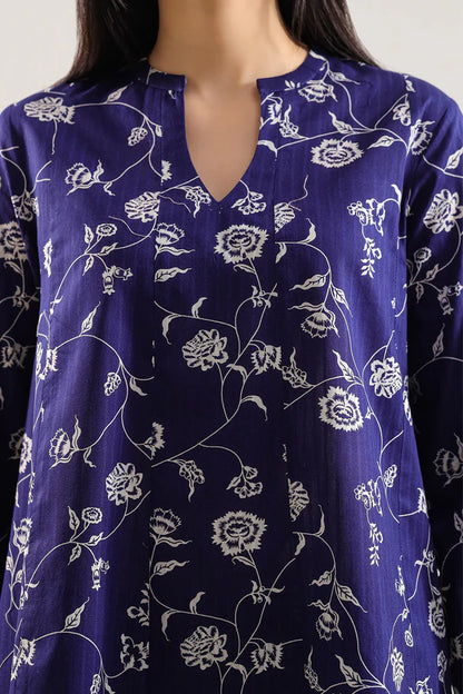 Model wearing Saya 2pc Unstitched Lawn Suit