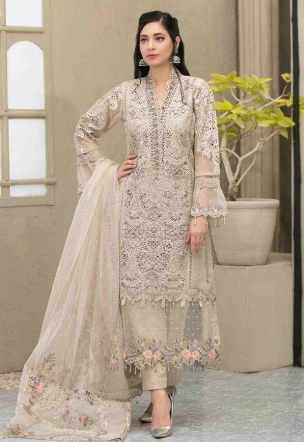 Full front shot of the Maria B Luxury Organza Embroidered Skin replica showcasing the hand-embellished V-neckline and pearl tassels.
