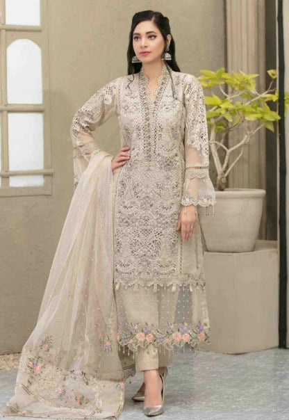 Full front shot of the Maria B Luxury Organza Embroidered Skin replica showcasing the hand-embellished V-neckline and pearl tassels.