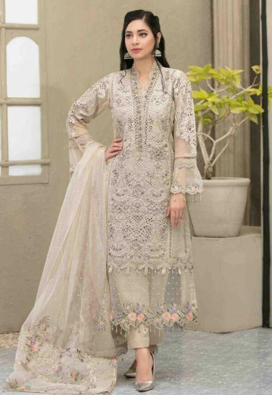 Full front shot of the Maria B Luxury Organza Embroidered Skin replica showcasing the hand-embellished V-neckline and pearl tassels.