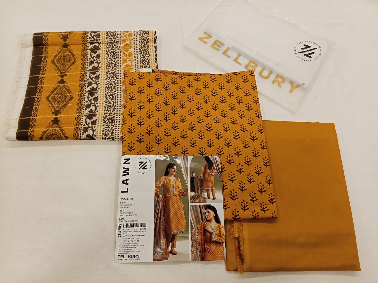 Orange Zellbury 3pc Unstitched Lawn Suit – Stylish Pakistani Lawn Outfit 2025
