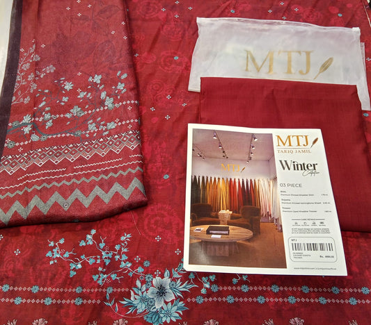 A flat lay showcasing the complete Maroon MTJ 3pc Unstitched Khaddar Suit set