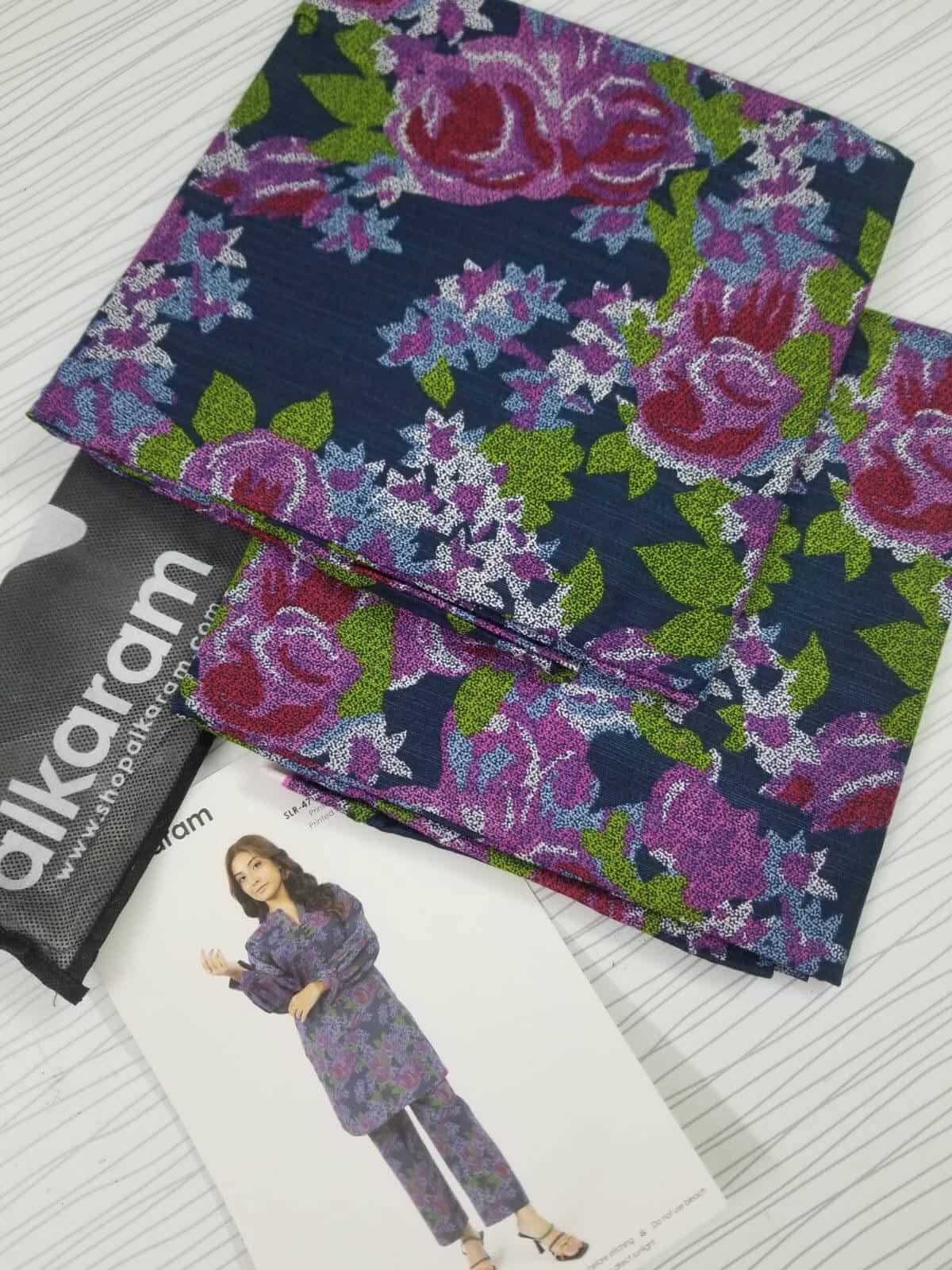 Deep Blue | Al-Karam 2pc Unstitched Khaddar Suit with floral printed fabric and model display.