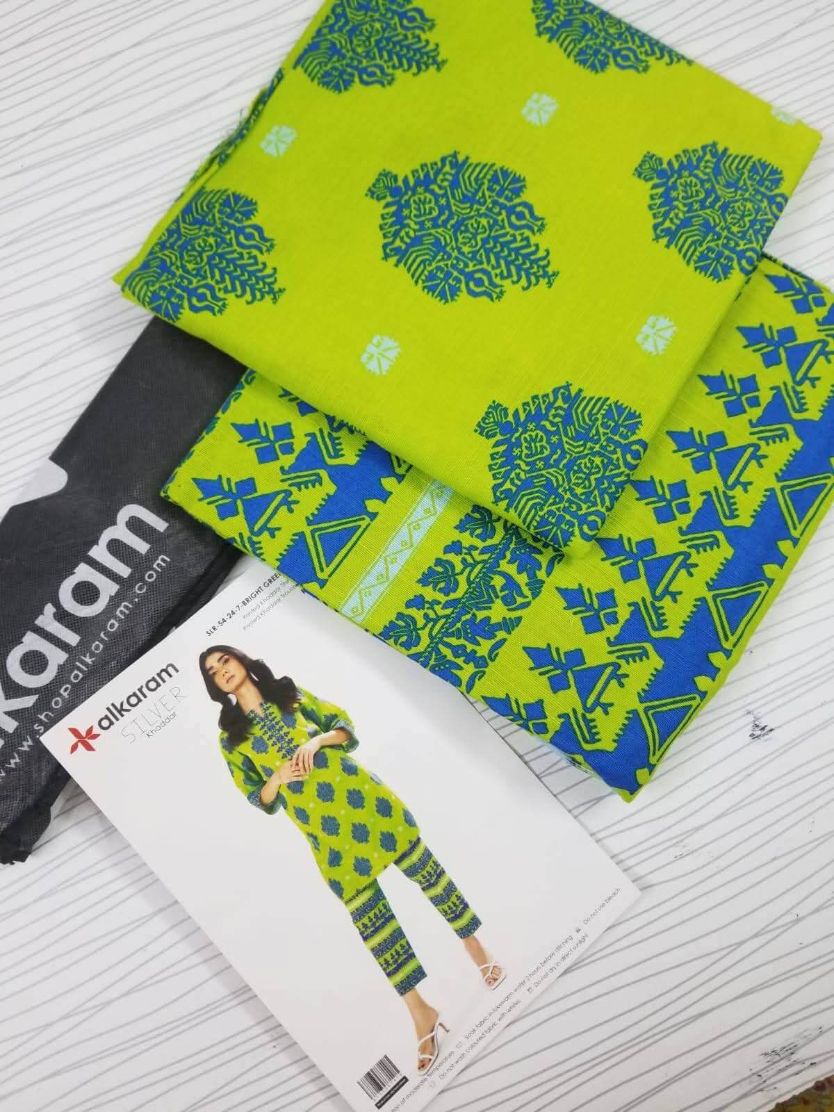 Bright Green | Al-Karam 2pc Unstitched Khaddar Suit showcasing printed khaddar fabric and design features.