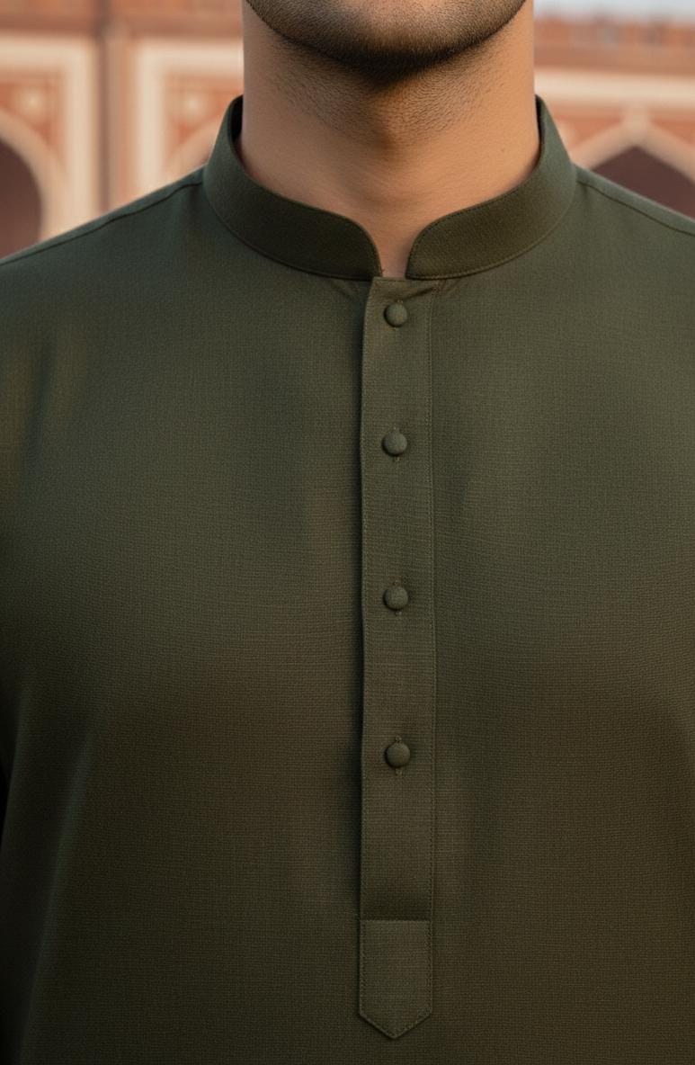 Dark Green Zellbury Mens Wash and Wear unstitched suit worn by a model showcasing a sharp tailored fit for Summer 2026.