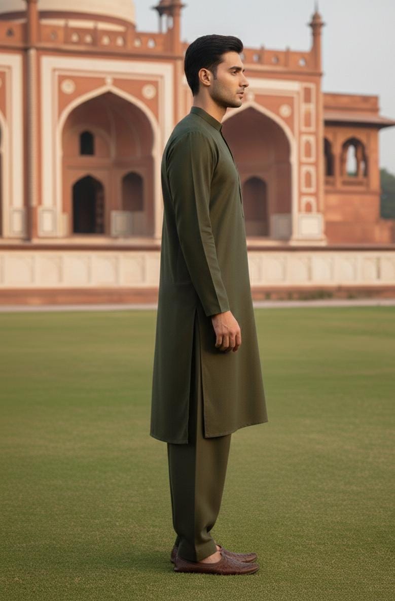 Dark Green Zellbury Mens Wash and Wear unstitched suit worn by a model showcasing a sharp tailored fit for Summer 2026.