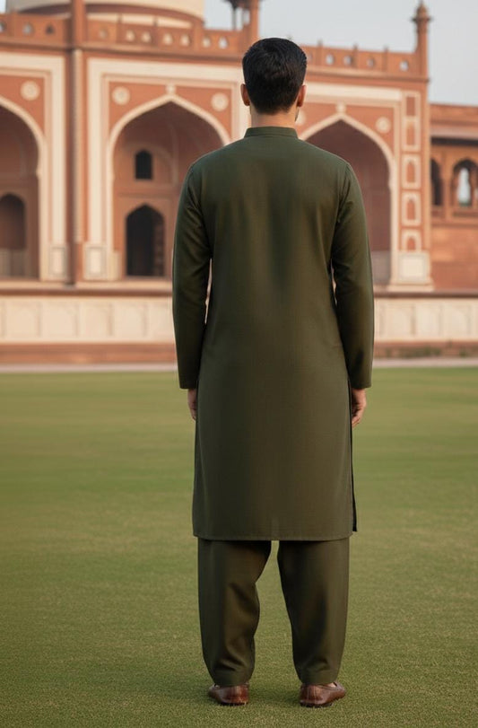 Dark Green Zellbury Mens Wash and Wear unstitched suit worn by a model showcasing a sharp tailored fit for Summer 2026.